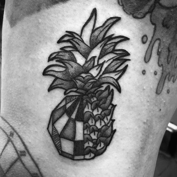 Unique black and grey tattoo of a pineapple with a disco ball base, blending tropical and retro aesthetics in a bold geometric design.