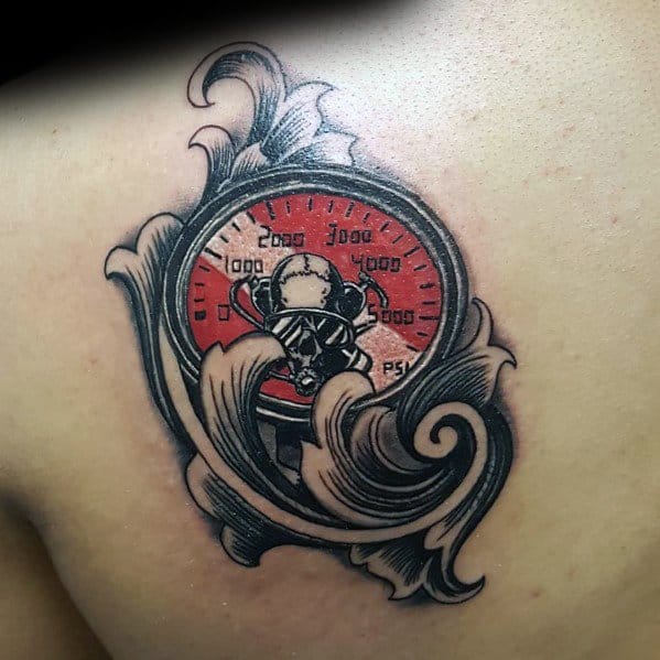 Tattoo of a dive pressure gauge with a skull in a diving mask, surrounded by ocean waves, symbolizing adventure, risk, and deep-sea exploration.