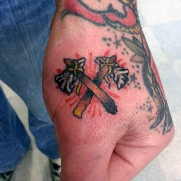 Cool Double Tomahawks Crossed Together Guys Hand Tattoo Above The Knuckle