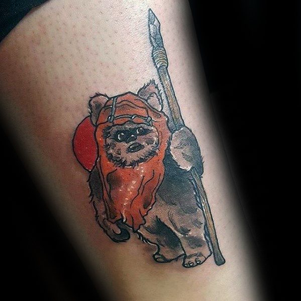 Simple Ewok tattoo featuring a spear and red sun backdrop, with soft shading and a classic Star Wars character pose.