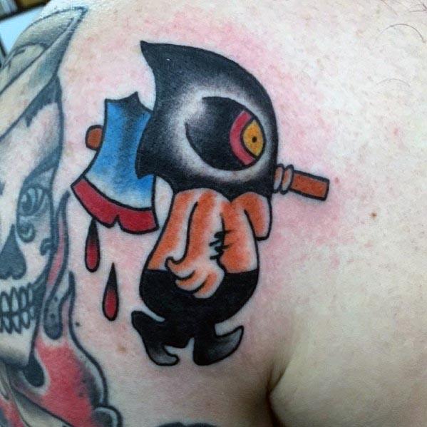 Cartoon-style executioner tattoo featuring a small hooded figure carrying a bloodied axe, with bold outlines and vibrant colors.