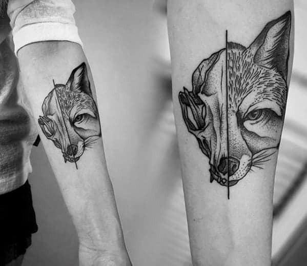 Split-face fox tattoos in black ink