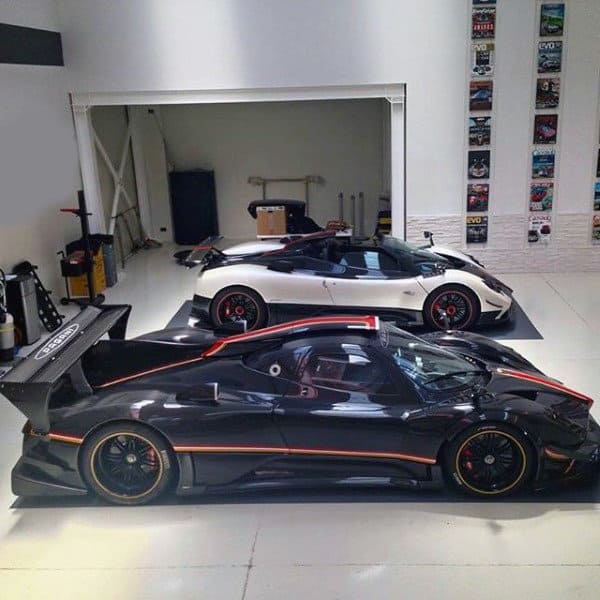 A sleek garage showcasing two stunning supercars with minimalist decor.