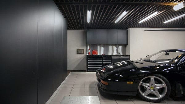 Cool Garage Lighting Layout With Black Ceiling And Cabinets