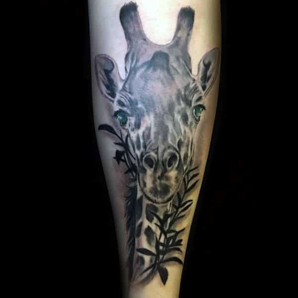Cool Giraffe In Trees With Leaves Tattoo For Males