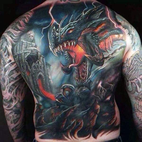 Dragon attacking town tattoo covering the entire back and arms