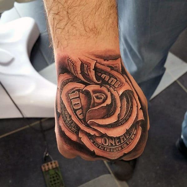 Hand tattoo of a rose made from folded dollar bills