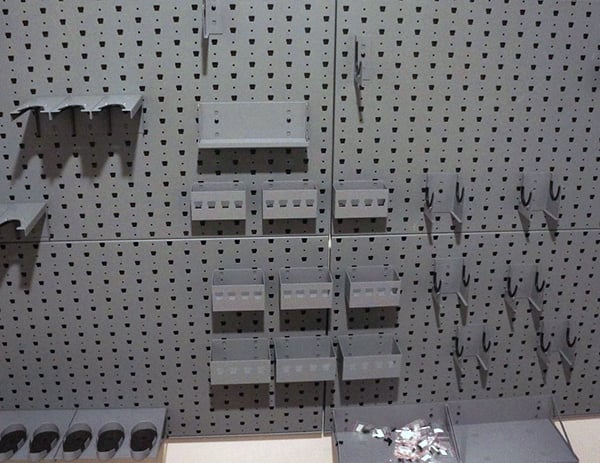 cool hangers and hook organized weapon storage