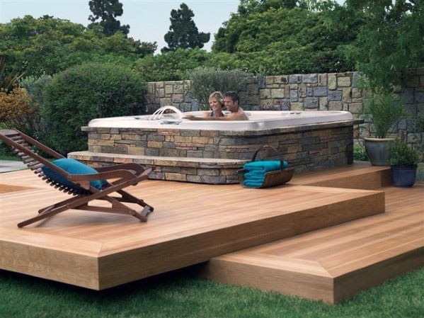 floating wood deck stone hot tub sun lounge