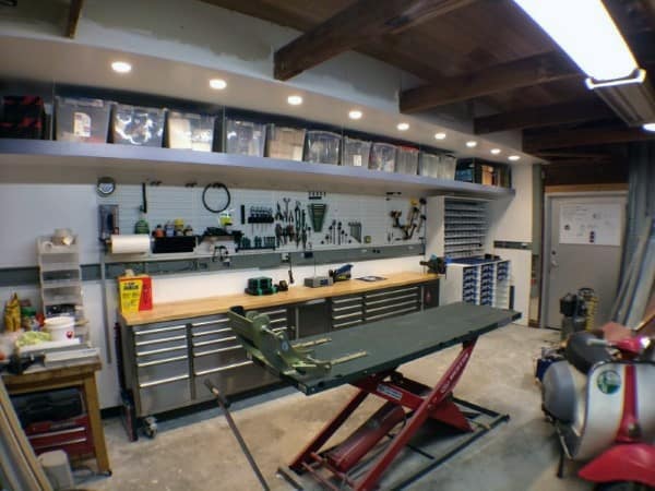 well organized garage workshop clear bin storage saw