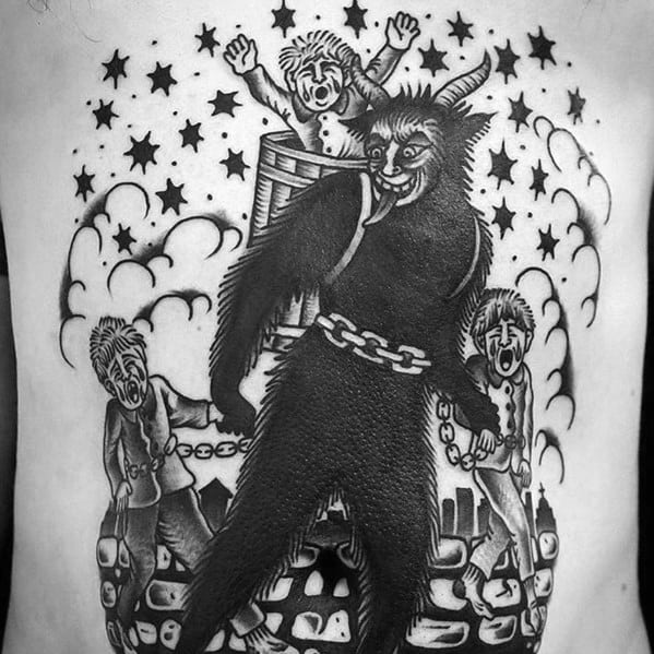 Black and grey Krampus tattoo showing the horned figure with chains, carrying a child in a basket, surrounded by crying children and stars.