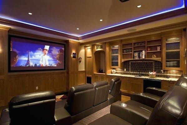 Cozy home theater with sleek LED crown molding lighting, creating a cinematic atmosphere