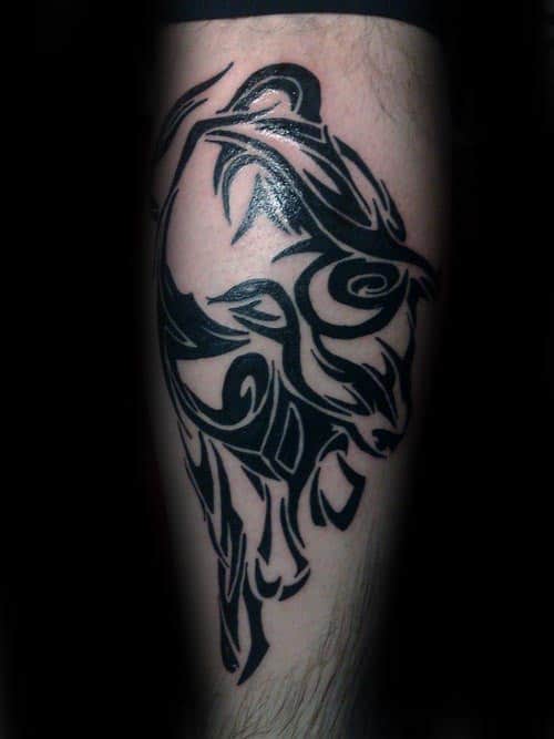 Cool Leg Tattoo For Men With Tribal Bull Design