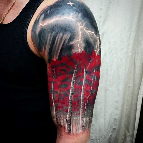 Realistic half-sleeve tattoo of a dramatic stormy sky with lightning over a striking red forest, blending nature and atmospheric intensity.