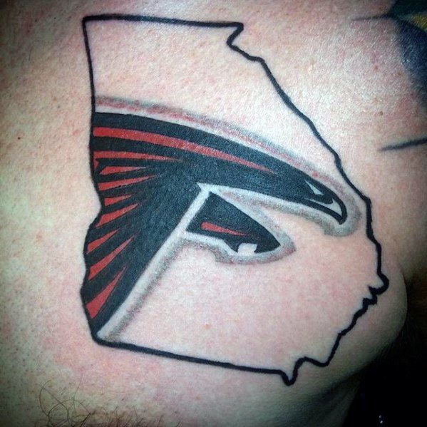 Atlanta Falcons logo tattoo inside the outline of Georgia state, featuring bold black and red detailing with sharp lines.