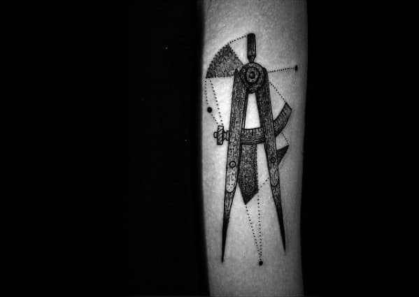 Tattoo of a detailed geometric compass with dotted lines, circles, and measuring tools, symbolizing precision, architecture, or engineering.