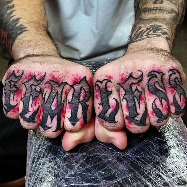 Cool Male Fearless Tattoo Designs On Fingers