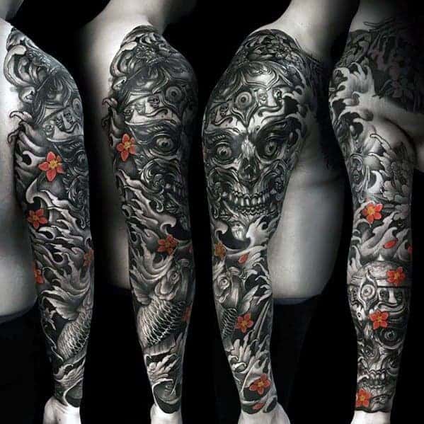 Tattooed arm sleeves showing intricate black designs with red flowers and skulls
