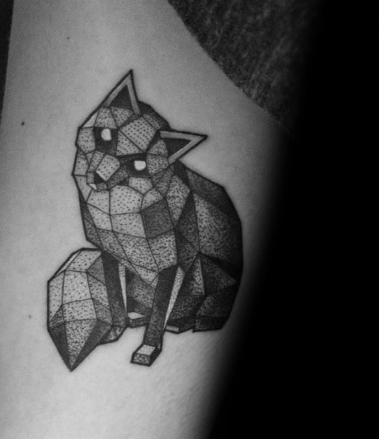 Geometric fox tattoo with polygonal shapes and dotwork shading, featuring a sitting pose and glowing eyes for a modern, mystical vibe.