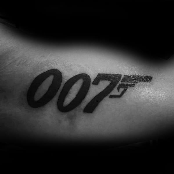 Cool Male James Bond 007 Tattoo Designs On Inner Arm Bicep