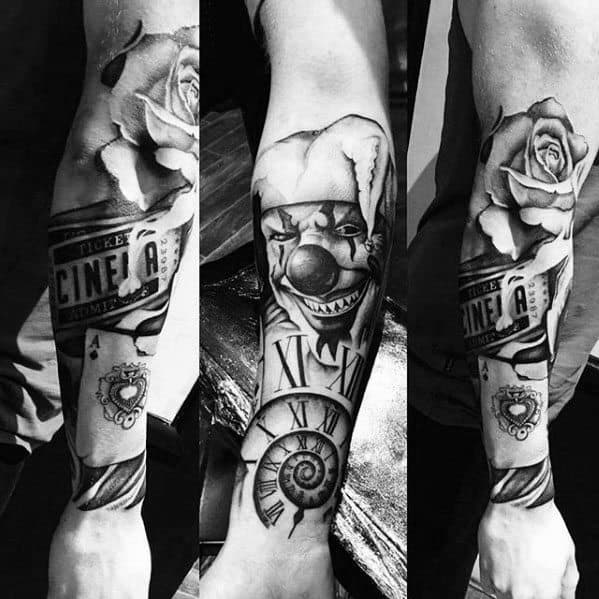 A black and gray sleeve tattoo featuring a clown with a jester hat, a rose, a clock with Roman numerals, a ticket stub, and a spiral design, blending time and symbolism.