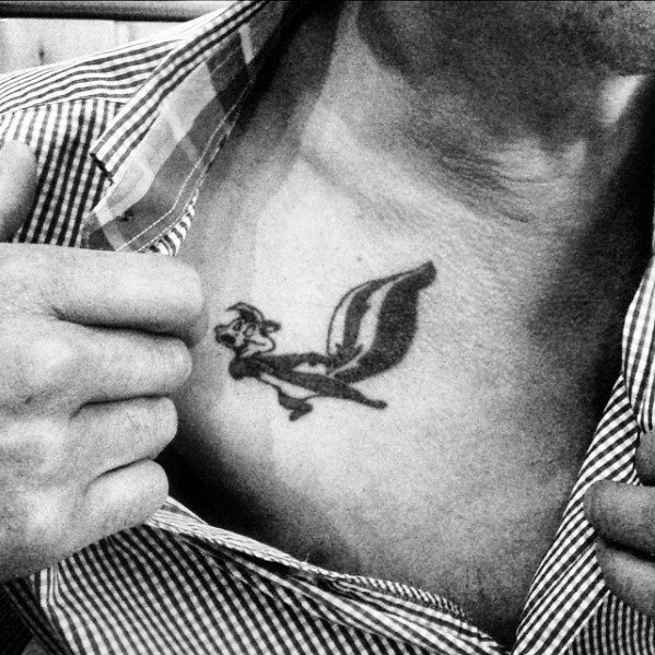 Cool Male Looney Tunes Shunk Upper Chesttattoo Designs