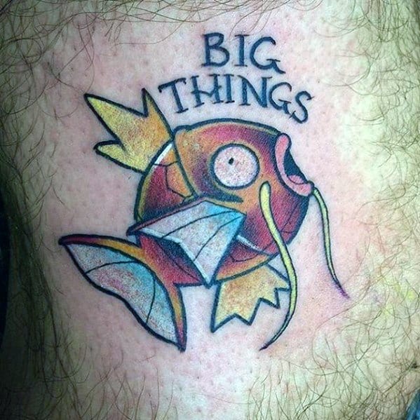 Simple Magikarp tattoo with the phrase "BIG THINGS" above it, symbolizing potential and transformation.