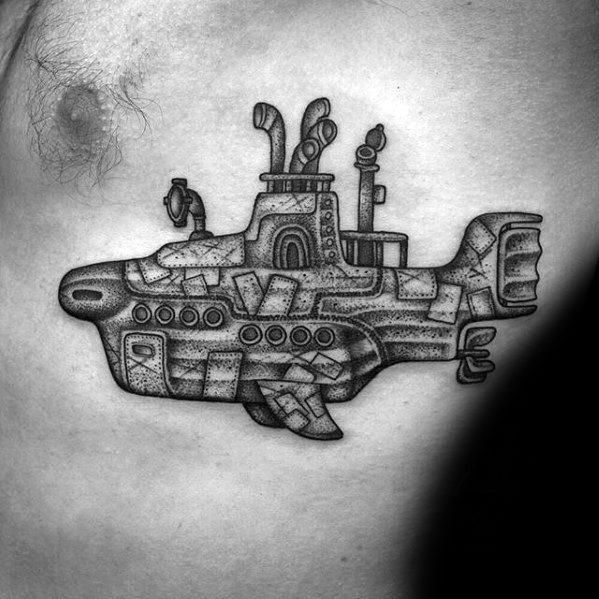 Detailed blackwork tattoo of the Yellow Submarine from The Beatles, featuring textured shading and intricate geometric linework.