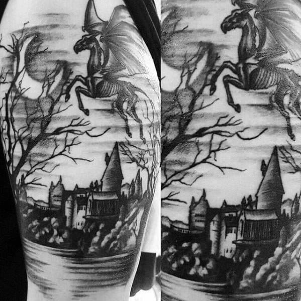 Detailed Thestral tattoo soaring over a dark, scenic depiction of Hogwarts with trees and water in a black and grey style.