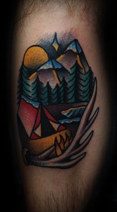 Dark-toned camping tattoo with tents, pine trees, snowy mountains, a full moon, and antlers framing the scene.