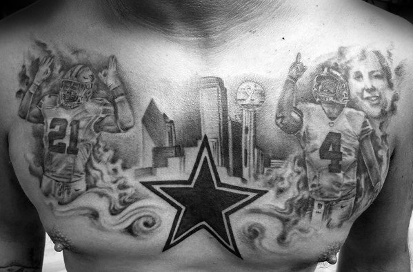 Dallas skyline chest tattoo with Cowboys players, central star, and a portrait, blending sports and city pride in black and gray ink.
