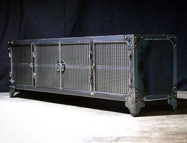 Industrial metal sideboard with mesh doors and a black finish, placed against a dark background