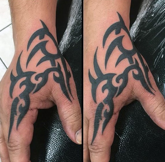 Cool Mens Black Ink Tribal Hand Tattoo Design Inspiration