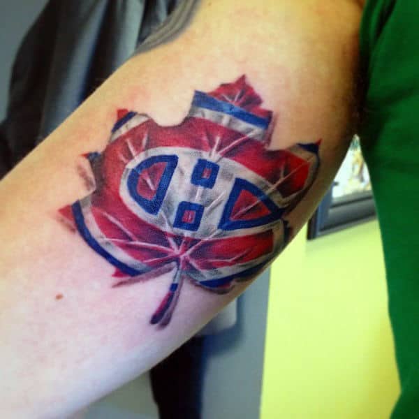 Cool Mens Leaf Hockey Logo Tattoo On Inner Arm Bicep