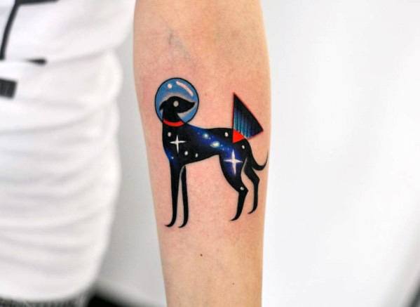 A creative greyhound tattoo with a space theme, featuring the dog wearing a helmet and surrounded by stars, with a vibrant color palette.