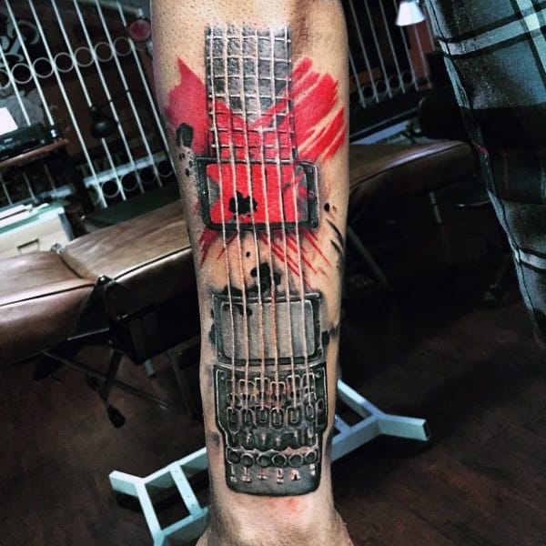 Cool Musical Tattoo With Red Strokes Tattoo On Legs For Men