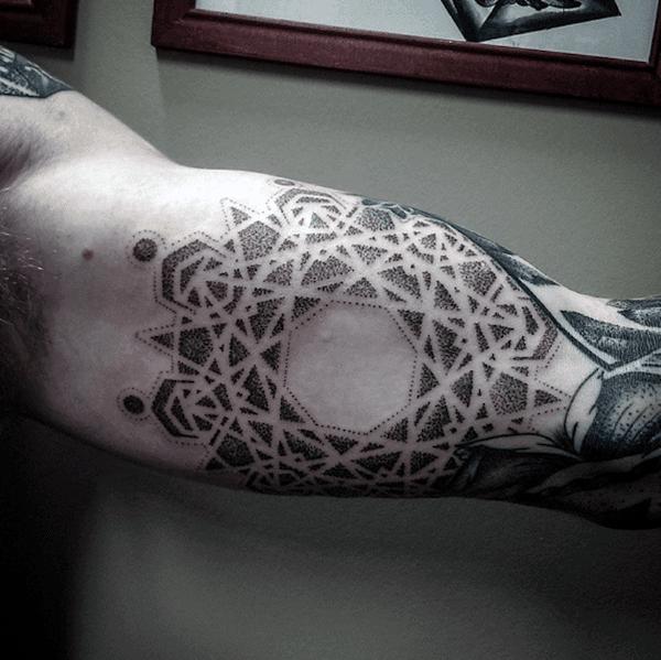 Cool Negative Space Pattern Mens Pointillism Tattoo On Inner Arm