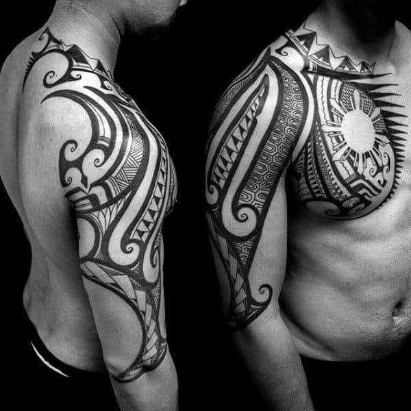 Cool Negative Space Sun Mens Arm Chest And Shoulder Tribal Tattoo Ideas