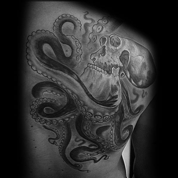 Octopus entwining a skull with detailed tentacles and shading, creating a bold, dark design with dramatic contrasts.