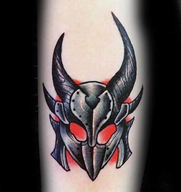 Tattoo of a horned Skyrim helmet with red eyes and glow effect