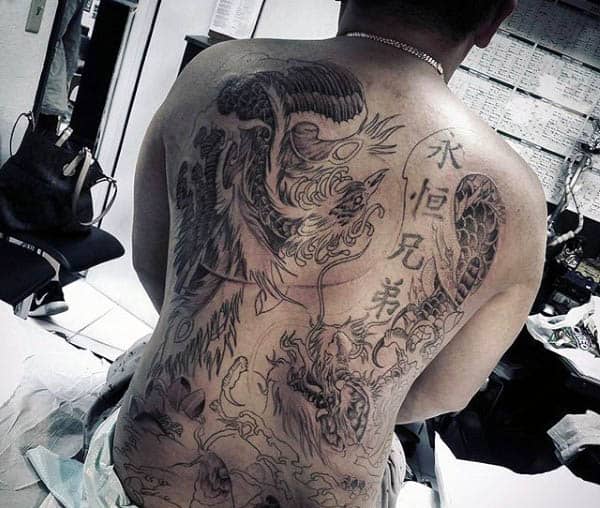 Cool Phoenix Male Back Tattoo Design Ideas