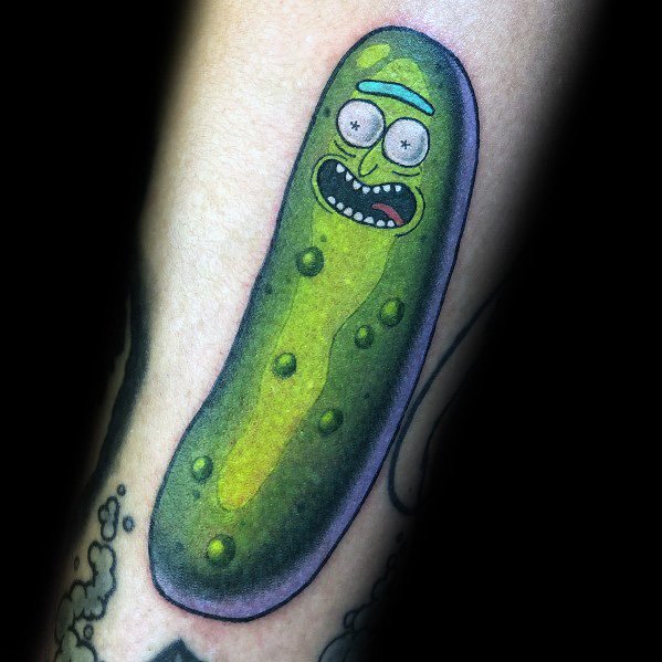Vibrant Pickle Rick tattoo with bold shading and a glowing green effect, capturing his classic shocked expression on the forearm.