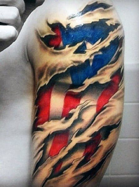 Puerto Rican flag tattoo with a dramatic ripped skin effect on the upper arm, revealing bold red, white, and blue colors with a striking star.