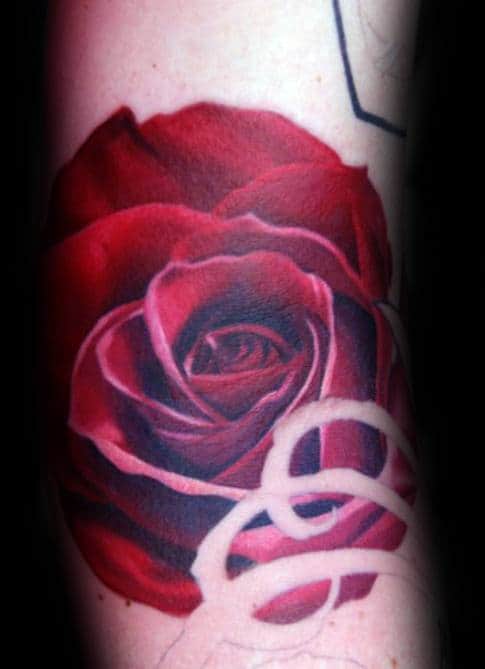 Realistic tattoo of a red rose on skin