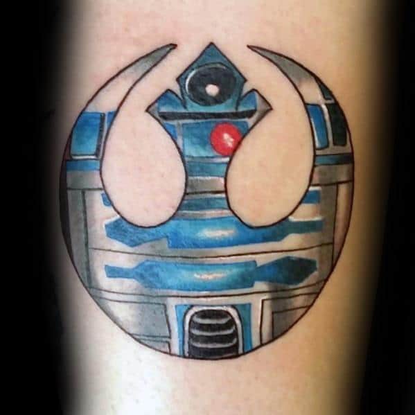 Rebel Alliance tattoo on the arm, designed with R2-D2's blue, silver, and red detailing.