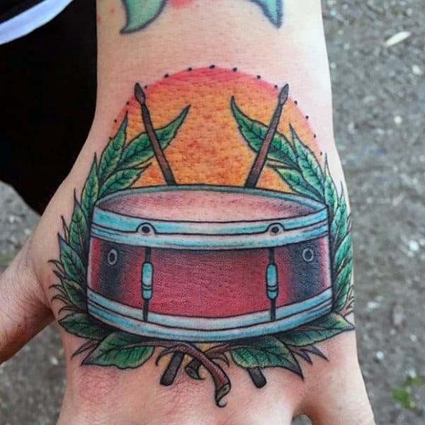 Cool Rising Sun Olive Branch Male Drum Tattoo On Hand