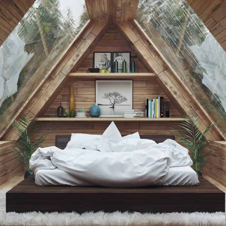 attic style bedroom with skylights 
