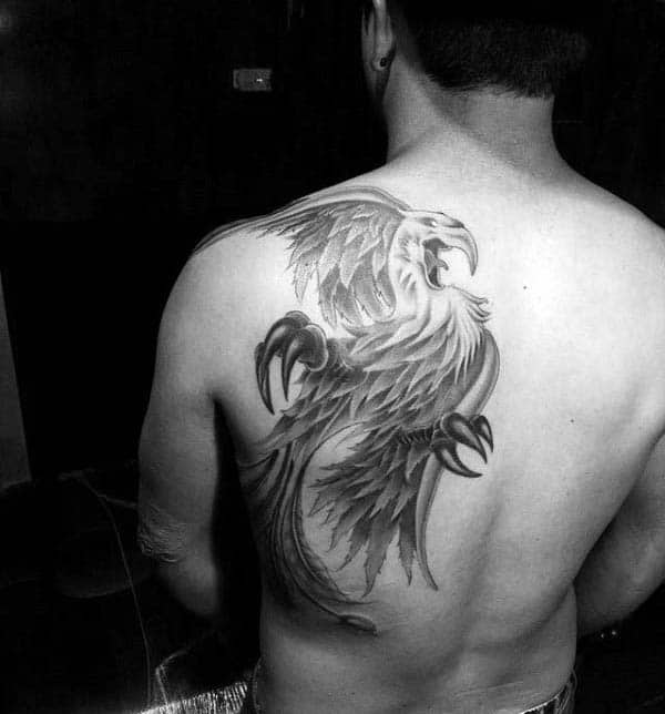 Cool Shoulder Blade And Back Phoenix Guys Tattoo Designs