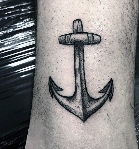 Black and gray anchor tattoo with fine dotwork shading, featuring a classic design that symbolizes strength, stability, and a deep nautical connection.