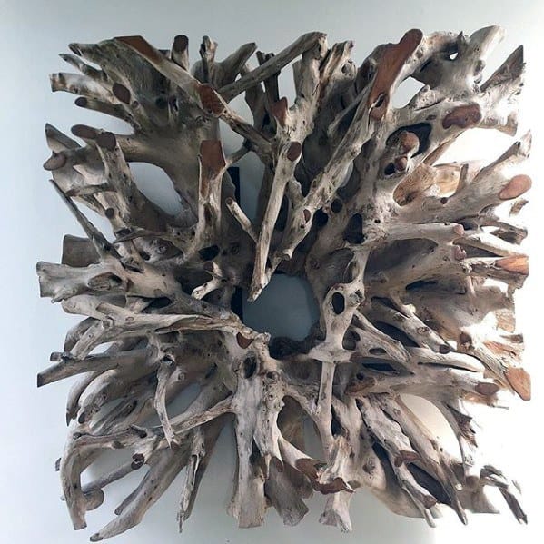 Abstract square driftwood wall art with intricate natural wood details.